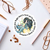 a sticker with a picture of a mermaid on it