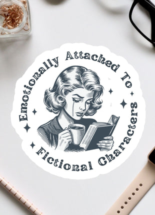 a sticker with a woman reading a book