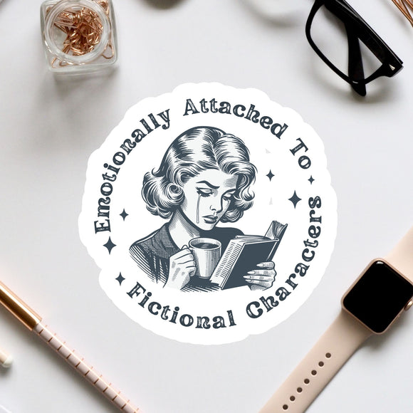 a sticker with a woman reading a book