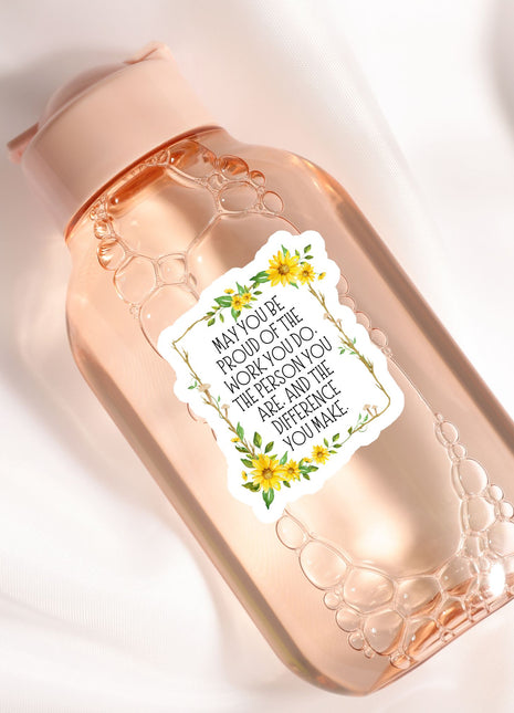 A pink bottle with a label that contains a message about the importance of the person being described.