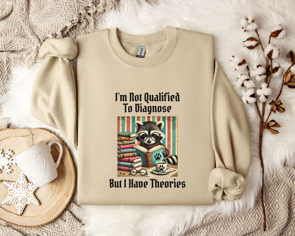 a beige sweatshirt with a graphic design of a raccoon reading a book, accompanied by the text 