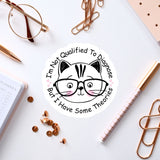 a sticker with a cat wearing glasses and surrounded by various office supplies, such as a pen, a pair of glasses, and a notebook.