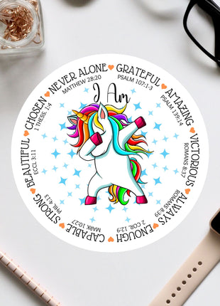 a white sticker with a colorful unicorn on it
