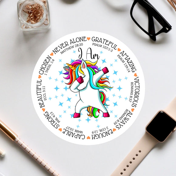 a white sticker with a colorful unicorn on it
