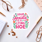 a sticker that says your anxiety is a lying hoe
