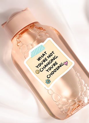 A bottle of lotion with a sticker on it.