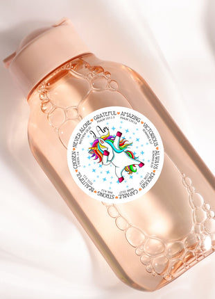 a bottle with a sticker on it sitting on a white surface