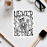 a sticker with a skeleton and the text "NEVER BETTER" in a black and white design.