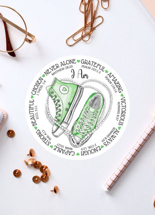 a pair of green sneakers on top of a white table