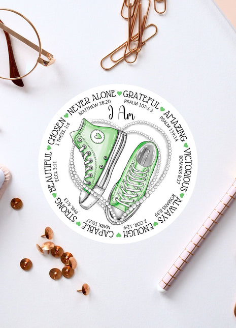 a pair of green sneakers on top of a white table