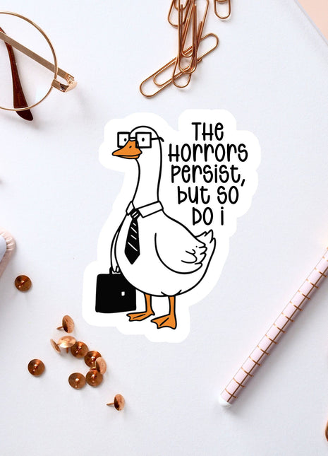 a sticker of a duck wearing glasses and a tie, surrounded by office supplies such as a pen, a notebook, and a pair of glasses.