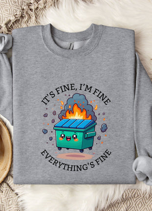 a gray sweatshirt with a graphic design depicting a green dumpster with flames coming out of it, accompanied by the text "It's fine, I'm fine Everything's fine".