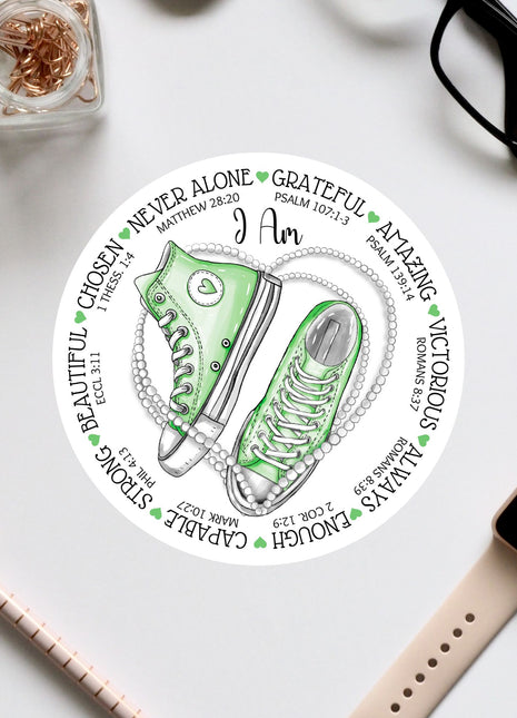 a sticker with a pair of green sneakers on it