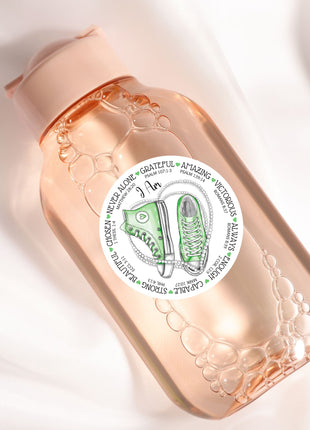 a close up of a bottle on a white surface