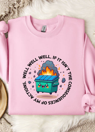 A pink sweatshirt with a graphic design featuring a cartoon dumpster with flames coming out of it, surrounded by text that reads "WELL WELL, IF IT ISN'T THE CONSEQUENCES".