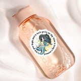 a bottle with a sticker of a mermaid on it
