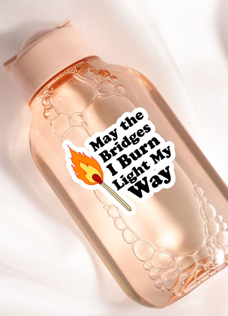 a pink bottle with a sticker on it