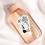 A pink bottle with a sticker featuring a cartoon goose wearing a tie and holding a briefcase.