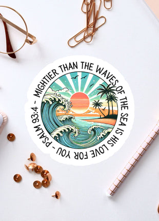 a sticker with a picture of a sunset and a wave