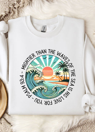 a white sweatshirt with a picture of a sunset on it