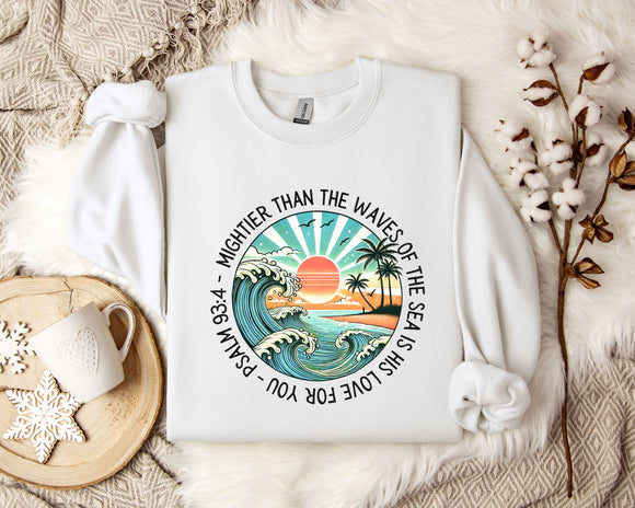 a white sweatshirt with a picture of a sunset on it