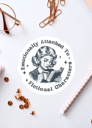 a sticker of a woman reading a book