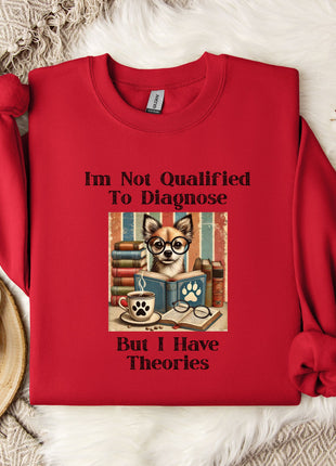A red sweater with a humorous text and an illustration of a dog wearing glasses, placed on a white fur rug with a coffee mug and a snowflake decoration nearby.