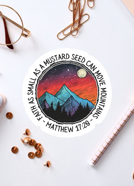 a sticker with a mountain scene on it