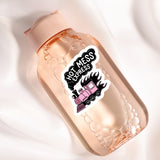 a close up of a bottle with a sticker on it