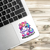 a sticker with a cartoon unicorn and the text "RESPECTFULLY" on a laptop keyboard.