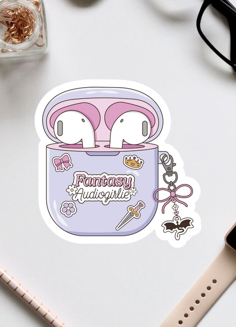 A sticker depicting a pair of earphones in a purple case with the text "Fantasy Audiogirl" and various decorative elements.