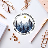 a sticker with a picture of a pine forest
