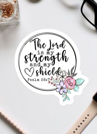 a sticker with a quote from the Bible verse Psalm 28:1, surrounded by a floral design.