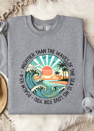 a sweater with a picture of a sunset on it