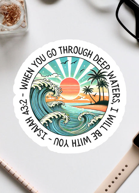 a sticker with a sunset and a wave on it