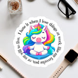 a sticker with a unicorn sitting on top of it