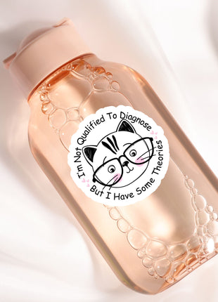 A pink bottle with a sticker featuring a cat's face and the text "I'm Not Qualified To Diagnose"