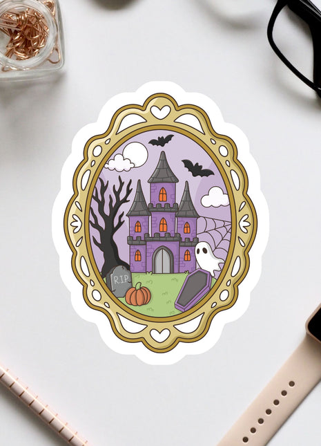 a Halloween-themed sticker or illustration of a castle, surrounded by various Halloween-related items such as a ghost, a spider, and a skeleton.