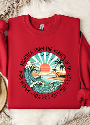 a red shirt with a picture of a sunset on it