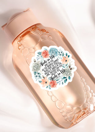 A pink bottle with a floral label, featuring a quote about being a bridesmaid.
