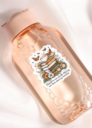 a bottle with a sticker on it sitting on a white surface