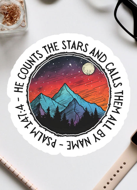 a sticker that says, the mountains the stars and the night the sky is