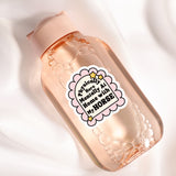 A pink bottle with a label that says "Physically Here Manually At Home With My Horse"