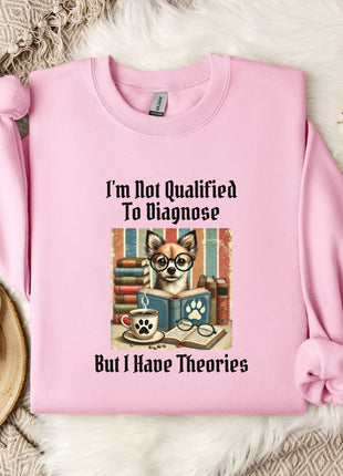 A pink sweatshirt with a graphic design of a dog wearing glasses and surrounded by books, along with the text "I'm Not Qualified To Diagnose But I Have Theories".