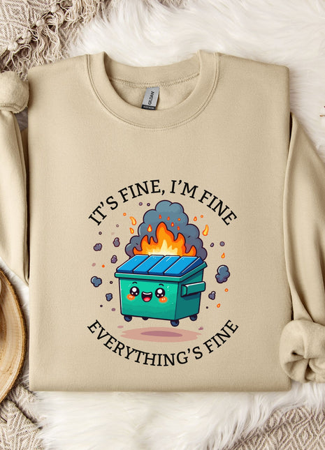 a beige sweatshirt with a graphic design depicting a trash can with flames coming out of it, accompanied by the text "It's fine, I'm fine Everything's fine".