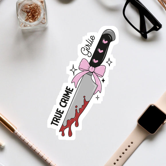 a sticker of a knife with a pink bow on it