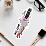 a sticker of a knife with a pink bow on it