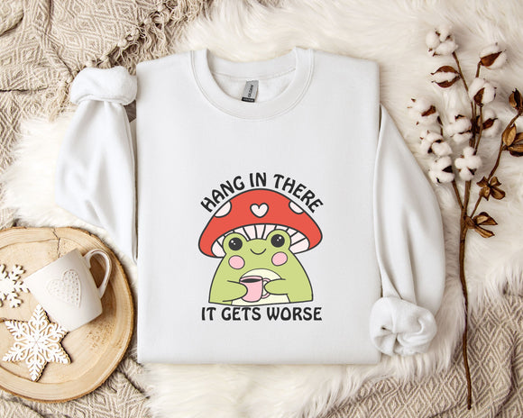 A white sweatshirt with a mushroom graphic and the text 